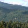 A view looking towards the west from Eddy Gulch. Gold producing mining operations covered this specific region and can be easily seen in the photographs along with the roads that provide excellent access. 