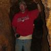 Claes Nordin, a 6' man, easily walks inside a tunnel at the Wilson Mine to demonstrate the size and magnitude of the work those old miners did. They carved this tunnel into the side of a mountain of solid rock.