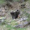 Another tunnel at the Wilson Mine with 100-year old sluices laying in wait.